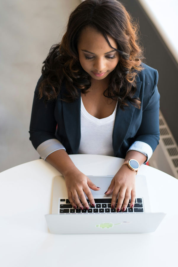 aaw-typing-in-suit-jacket
