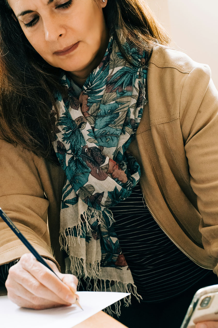 woman-writing-with-scarf